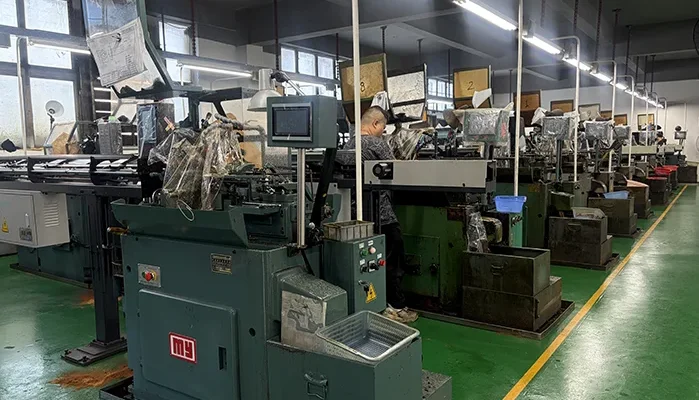 FIWOK METALWORKS automatic screw machine manufacturing plant and high-volume automatic lathe turning workshop in Shenzhen, showing rows of precision cam-operated screw machines fabricating high-tolerance metal hardware and custom OEM fasteners.