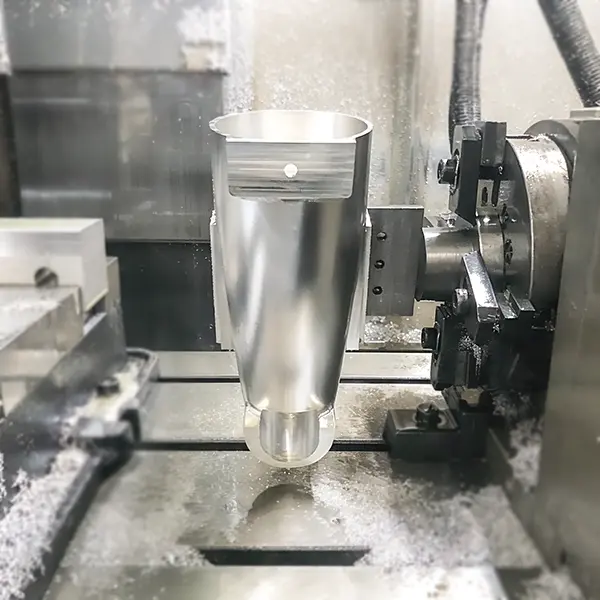 Precision 5-axis CNC milling of a complex aluminum housing, demonstrating capability for parts with intricate geometries.