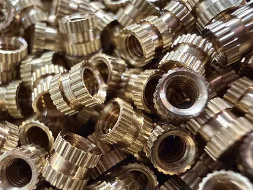 Brass knurled insert nut with internal thread for electronic hardware, OEM assemblies, and repeat-production turned parts.