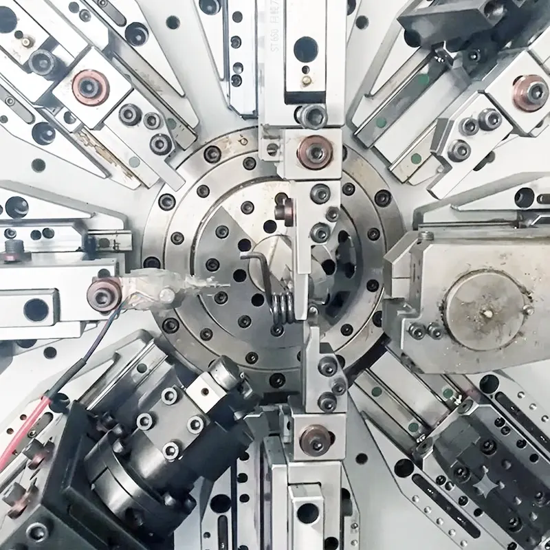 Multi-axis CNC wire bending and custom wire shaping process executing synchronized dimensional control for industrial components.