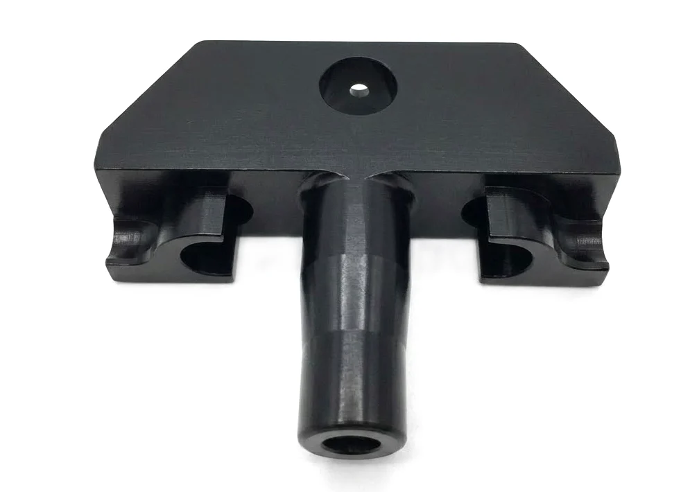 Representative steel CNC machined part with a black oxide conversion finish.